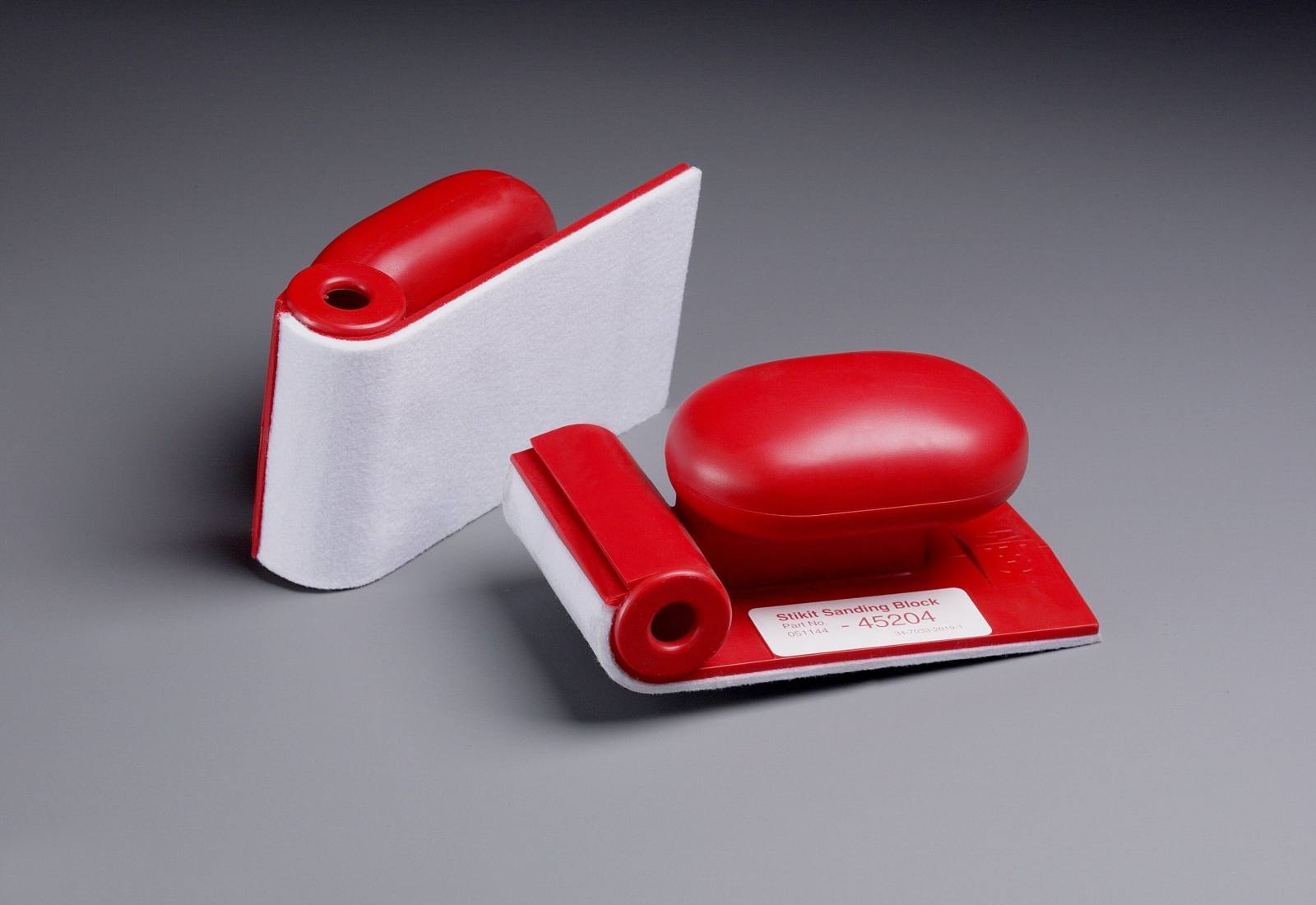 3M Hand block with integrated roll dispenser, red, 63 mm x 120 mm